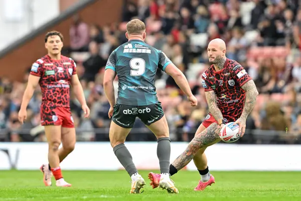 stock image Zak Hardaker of Leigh Leopards looks for a pass during the Betfred Super League Round 17 match Leigh Leopards vs Huddersfield Giants at Leigh Sports Village, Leigh, United Kingdom, 13th July 2024 