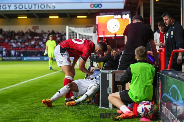 stock image Kadan Young of Aston Villa collides with a camera man during the Pre-season friendly match Walsall vs Aston Villa at Bescot Stadium, Walsall, United Kingdom, 17th July 2024 