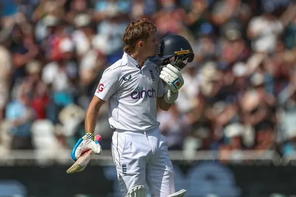 stock image Ollie Pope of England celebrates a century (100 runs) by kissing his helmet during the 2nd Rothesay Test Match match England vs West Indies at Trent Bridge, Nottingham, United Kingdom, 18th July 2024 