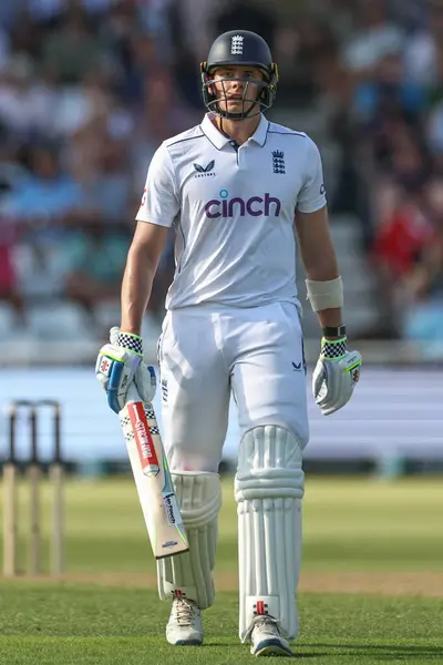 stock image A dejected Jamie Smith of England leaves the field of play after he is caught out by Jason Holder of West Indies during the 2nd Rothesay Test Match match England vs West Indies at Trent Bridge, Nottingham, United Kingdom, 18th July 2024 