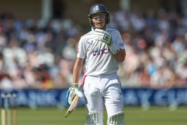 stock image Ollie Pope of England leaves the field of play after being caught out by Kavem Hodge of West Indies during the 2nd Rothesay Test Match match England vs West Indies at Trent Bridge, Nottingham, United Kingdom, 18th July 2024 