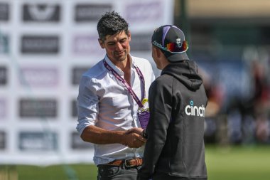 Former England cricketer Alastair Cook shakes hands with Ollie Pope of England during the Rothesay Test Match day four match England vs West Indies at Trent Bridge, Nottingham, United Kingdom, 21st July 2024 clipart