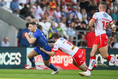 George Williams of Warrington Wolves  is tackled by Lewis Dodd of St. Helens during the Betfred Super League Round 18 match St Helens vs Warrington Wolves at Totally Wicked Stadium, St Helens, United Kingdom, 19th July 2024 clipart