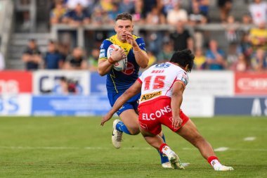 Warrington Wolves 'tan George Williams, 19 Temmuz 2024' te St Helens - Warrington Wolves maçında St. Helens - St Helens maçında St. Helens 'in St. Helens' a karşı oynadığı St. Helens Süper Lig karşılaşmasında St. Helens 'li James Bell tarafından yenildi.