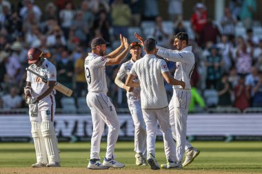 Shoaib Bashir of England celebrates the wicket of Shamar Joseph of West Indies to win the game during the Rothesay Test Match day four match England vs West Indies at Trent Bridge, Nottingham, United Kingdom, 21st July 2024 clipart