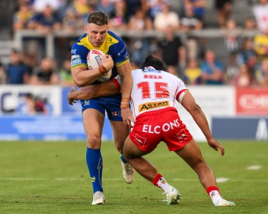 Warrington Wolves 'tan George Williams, 19 Temmuz 2024' te St Helens - Warrington Wolves maçında St. Helens - St Helens maçında St. Helens 'in St. Helens' a karşı oynadığı St. Helens Süper Lig karşılaşmasında St. Helens 'li James Bell tarafından yenildi.