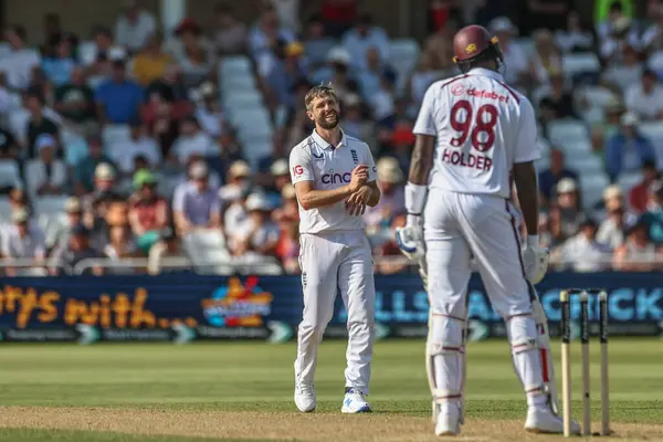 Stock image Chris Woakes of England laughs and reacts after a close ball on Jason Holder of West Indies during the 2nd Rothesay Test Match day two England v West Indies at Trent Bridge, Nottingham, United Kingdom, 19th July 2024