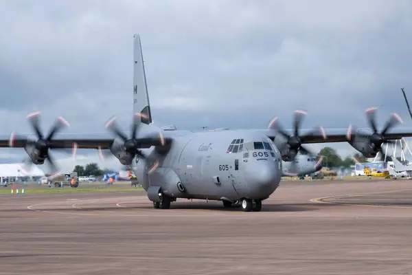 stock image Lockheed Martin CC-130J Hercules of 436 TRANSPORT SQUADRON Royal Canadian Air Force taxis during The Royal International Air Tattoo 2024 Departures Day at RAF Fairford, Cirencester, United Kingdom, 22nd July 2024