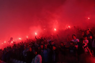 Rangers fans with pyrotechnics during the Pre-season friendly match Birmingham City vs Rangers at St Andrews, Birmingham, United Kingdom, 24th July 2024 clipart