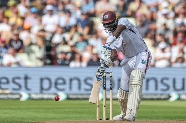 Jason Holder of West Indies hits the ball for two runs and gets his half century during the 3rd Rothesay Test Match Day One match England vs West Indies at Edgbaston, Birmingham, United Kingdom, 26th July 2024
