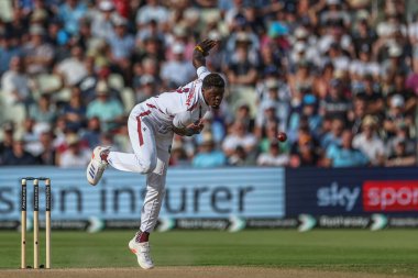 Alzarri Joseph of West Indies delivers the ball during the 3rd Rothesay Test Match Day One match England vs West Indies at Edgbaston, Birmingham, United Kingdom, 26th July 2024 clipart