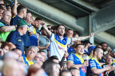 Warrington Wolves taraftarları 19. Betfred Süper Lig karşılaşmasında Wigan Warriors 'a karşı Wigan Wolves, Wigan Stadyumu, Birleşik Krallık, 26 Temmuz 2024