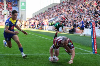 Wigan Warriors 'dan Liam Marshall 26 Temmuz 2024' te Wigan Wolves 'a karşı oynanan 19. Betfred Süper Lig karşılaşmasında skoru 4-6 yaptı.