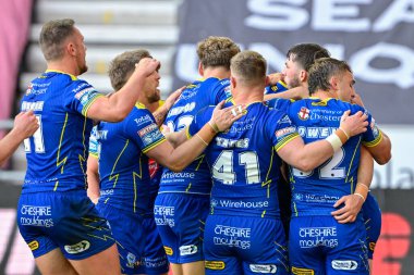 Warrington Wolves 'tan Adam Holroyd, 26 Temmuz 2024' te İngiltere 'nin Wigan Stadyumu' nda oynanan 19. Wigan Warriors - Warrington Wolves maçında 4-10 Warrington maçını kutluyor.