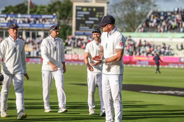 stock image Ben Stokes of England applauds his players as they leave the field at the end of day two during Day Two of the Rothesay Test match England vs West Indies at Edgbaston, Birmingham, United Kingdom, 27th July 2024