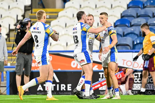 stock image Ash Handley of Leeds Rhinos celebrates his try to make it 6-22 Leeds Rhinos during the Betfred Super League Round 19 match Huddersfield Giants vs Leeds Rhinos at John Smith's Stadium, Huddersfield, United Kingdom, 25th July 2024