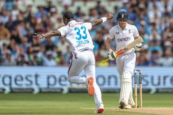 stock image Jayden Seales of West Indies celebrates the wicket of Harry Brook of England during Day Two of the Rothesay Test match England vs West Indies at Edgbaston, Birmingham, United Kingdom, 27th July 2024