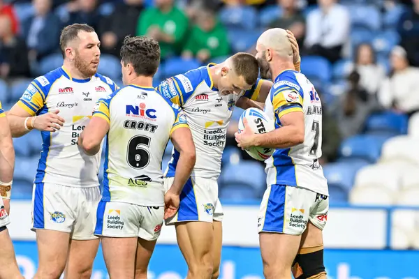 stock image Matt Frawley of Leeds Rhinos celebrates his try to make it 6-16 Leeds Rhinos during the Betfred Super League Round 19 match Huddersfield Giants vs Leeds Rhinos at John Smith's Stadium, Huddersfield, United Kingdom, 25th July 2024