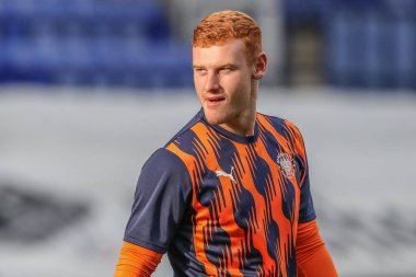 Blackpool 'dan Mackenzie Chapman, 30 Temmuz 2024' te İngiltere, Birkenhead 'deki Prenton Park' ta oynanan sezon öncesi hazırlık maçında Tranmere Rovers 'a karşı Blackpool maçında ısındı.