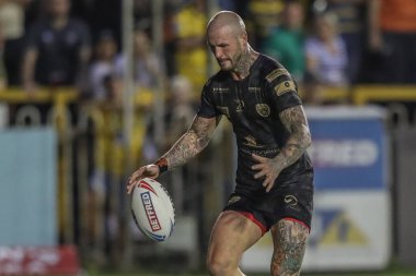 Zak Hardaker of Leigh Leopards chases the ball down during the Betfred Super League Round 20 match Castleford Tigers vs Leigh Leopards at The Mend-A-Hose Jungle, Castleford, United Kingdom, 1st August 2024 clipart