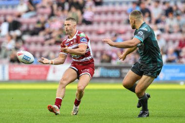 Wigan Warriors takımından Ryan Hampshire, 1 Ağustos 2024 'te Wigan Warriors ile Huddersfield Giants arasında oynanan 20.