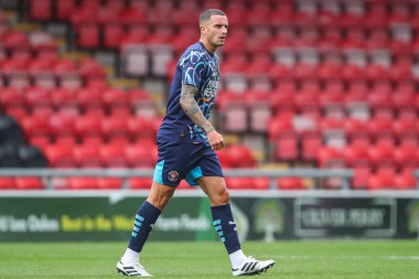 Blackpool 'dan Oliver Norburn, Crewe Alexandra' ya karşı Blackpool 'un 3 Ağustos 2024' teki Alexandra Stadyumu 'nda oynanan hazırlık maçı sırasında