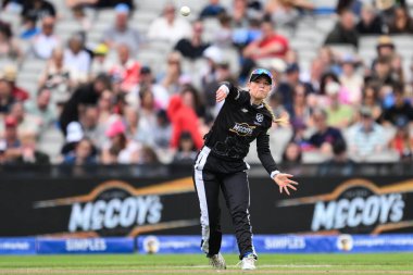 Alice Monaghan of Manchester Originals throws at the stumps during the The Hundred match Manchester Originals Women vs Oval Invincibles Women at Old Trafford, Manchester, United Kingdom, 6th August 2024  clipart