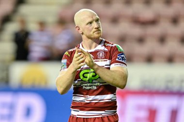 Liam Farrell of Wigan Warriors claps fans at full time during the Betfred Super League match Wigan Warriors vs Leigh Leopards at DW Stadium, Wigan, United Kingdom, 6th August 2024 clipart