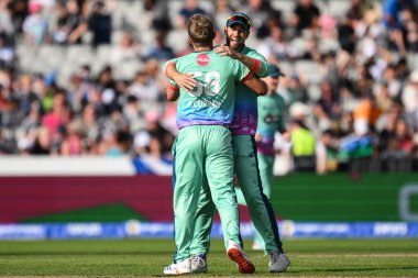 Sam Curran of Oval Invincibles celebrates his teams win during the The Hundred match Manchester Originals vs Oval Invincibles at Old Trafford, Manchester, United Kingdom, 6th August 2024 clipart