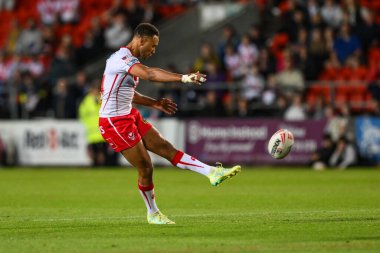 St. Helens takımından Moses Mbye, 8 Ağustos 2024 'te St Helens - Salford Red Devils maçında Betfred Süper Lig Maçı' nı kazanmak için ekstra bir gol attı.