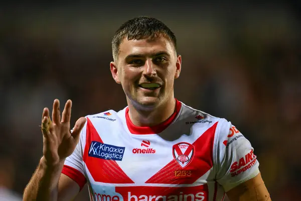 stock image Lewis Dodd of St. Helens waves to fans during the Betfred Super League Round 21 match St Helens vs Salford Red Devils at Totally Wicked Stadium, St Helens, United Kingdom, 8th August 2024