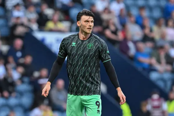 stock image Will Keane of Preston North End warms up ahead of the Sky Bet Championship match Preston North End vs Sheffield United at Deepdale, Preston, United Kingdom, 9th August 2024