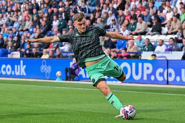 stock image Harrison Burrows of Sheffield United passes  ball during the Sky Bet Championship match Preston North End vs Sheffield United at Deepdale, Preston, United Kingdom, 9th August 2024