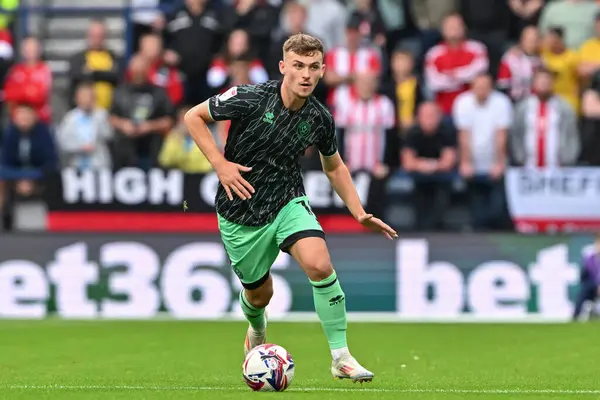 stock image Harrison Burrows of Sheffield United passes  ball during the Sky Bet Championship match Preston North End vs Sheffield United at Deepdale, Preston, United Kingdom, 9th August 2024