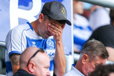 QPR taraftarları, 10 Ağustos 2024 'te Londra' daki Kiyan Prince Foundation Stadyumu 'nda oynanan Queens Park Rangers - West Bromwich Albion maçının ardından oynanan Sky Bet Şampiyonası yenilgisinin ardından üzgün görünüyorlar.