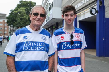 Queens Park Rangers fans arrive at Matrade Loftus Road Stadium prior to the Sky Bet Championship match Queens Park Rangers vs West Bromwich Albion at Kiyan Prince Foundation Stadium, London, United Kingdom, 10th August 2024 clipart