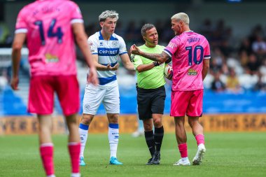 Jimmy Dunne of Queens Park Rangers and John Swift of West Bromwich Albion react during the Sky Bet Championship match Queens Park Rangers vs West Bromwich Albion at Kiyan Prince Foundation Stadium, London, United Kingdom, 10th August 2024 clipart