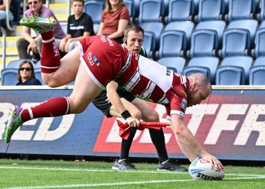 Wigan Warriors 'dan Liam Marshall, 10 Ağustos 2024' te Headingley Stadyumu, Leeds, Birleşik Krallık 'ta oynanan Betfred Süper Lig 21. Round karşılaşmasında 24-4 öne geçmeye çalışıyor.