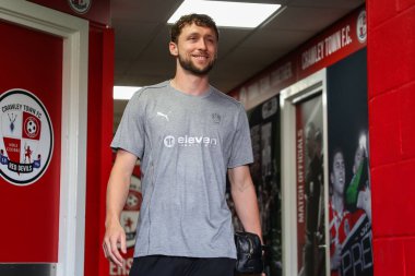 Matthew Pennington of Blackpool arrives ahead of the Sky Bet League 1 match Crawley Town vs Blackpool at Broadfield Stadium, Crawley, United Kingdom, 10th August 2024 clipart