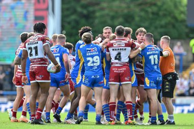 Tempers spill over as the two teams clash during the Betfred Super League Round 21 match Leeds Rhinos vs Wigan Warriors at Headingley Stadium, Leeds, United Kingdom, 10th August 2024 clipart