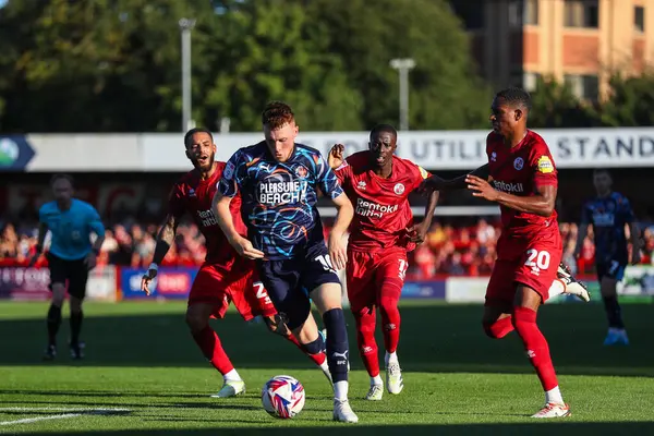 stock image Sonny Carey of Blackpool breaks with the ball during the Sky Bet League 1 match Crawley Town vs Blackpool at Broadfield Stadium, Crawley, United Kingdom, 10th August 2024