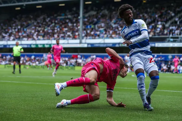 stock image Tom Fellows of West Bromwich Albion battles for the ball with Jake Clarke-Salter of Queens Park Rangers during the Sky Bet Championship match Queens Park Rangers vs West Bromwich Albion at Kiyan Prince Foundation Stadium, London, United Kingdom