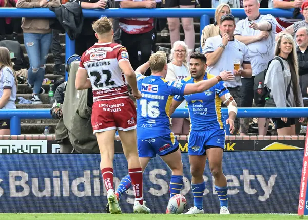 stock image Rhyse Martin of Leeds Rhinos celebrates his try to make it 28-4 Leeds during the Betfred Super League Round 21 match Leeds Rhinos vs Wigan Warriors at Headingley Stadium, Leeds, United Kingdom, 10th August 2024