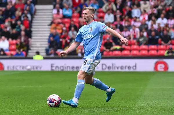 stock image Jamie Allen of Coventry City makes a break with the ball  during the Sky Bet Championship match Stoke City vs Coventry City at Bet365 Stadium, Stoke-on-Trent, United Kingdom, 10th August 2024