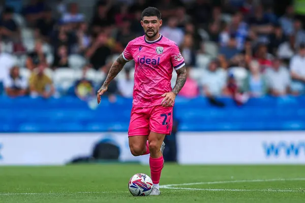 stock image Alex Mowatt of West Bromwich Albion runs with the ball during the Sky Bet Championship match Queens Park Rangers vs West Bromwich Albion at Kiyan Prince Foundation Stadium, London, United Kingdom, 10th August 2024