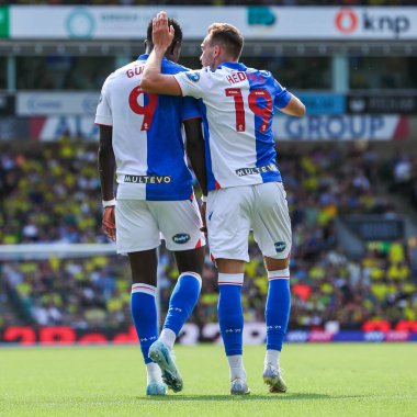 Blackburn Rovers takımından Ryan Hedges, 17 Ağustos 2024 'te Norwich City, Norwich Road, Norwich, İngiltere' de Blackburn Rovers 'a karşı oynanan Sky Bet Şampiyonası maçında takımın ilk golünü attıktan sonra takım arkadaşlarıyla kutluyor.