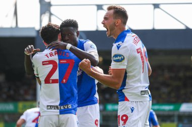 Blackburn Rovers takımından Ryan Hedges, 17 Ağustos 2024 'te Norwich City, Norwich Road, Norwich, İngiltere' de Blackburn Rovers 'a karşı oynanan Sky Bet Şampiyonası maçında takımın ilk golünü attıktan sonra takım arkadaşlarıyla kutluyor.