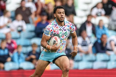 Darnell McIntosh of Leigh Leopards in action during the Magic Weekend match Leigh Leopards vs Salford Red Devils at Elland Road, Leeds, United Kingdom, 18th August 2024 clipart