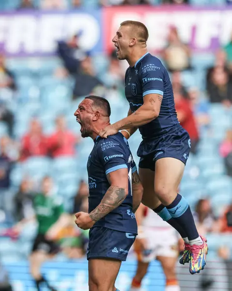 stock image Elliot Minchella of Hull KR breaks through to go over for a 30 yard solo try during the Magic Weekend match Catalans Dragons vs Hull KR at Elland Road, Leeds, United Kingdom, 18th August 2024