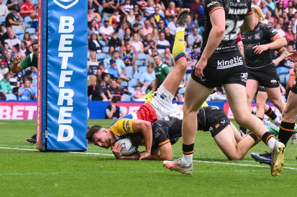 stock image Josh Rourke of London Broncos goes over for a try during the Magic Weekend match Hull FC vs London Broncos at Elland Road, Leeds, United Kingdom, 17th August 2024